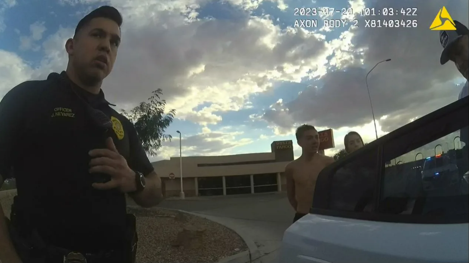 Shocking videos show police holding family at gunpoint as they rushed